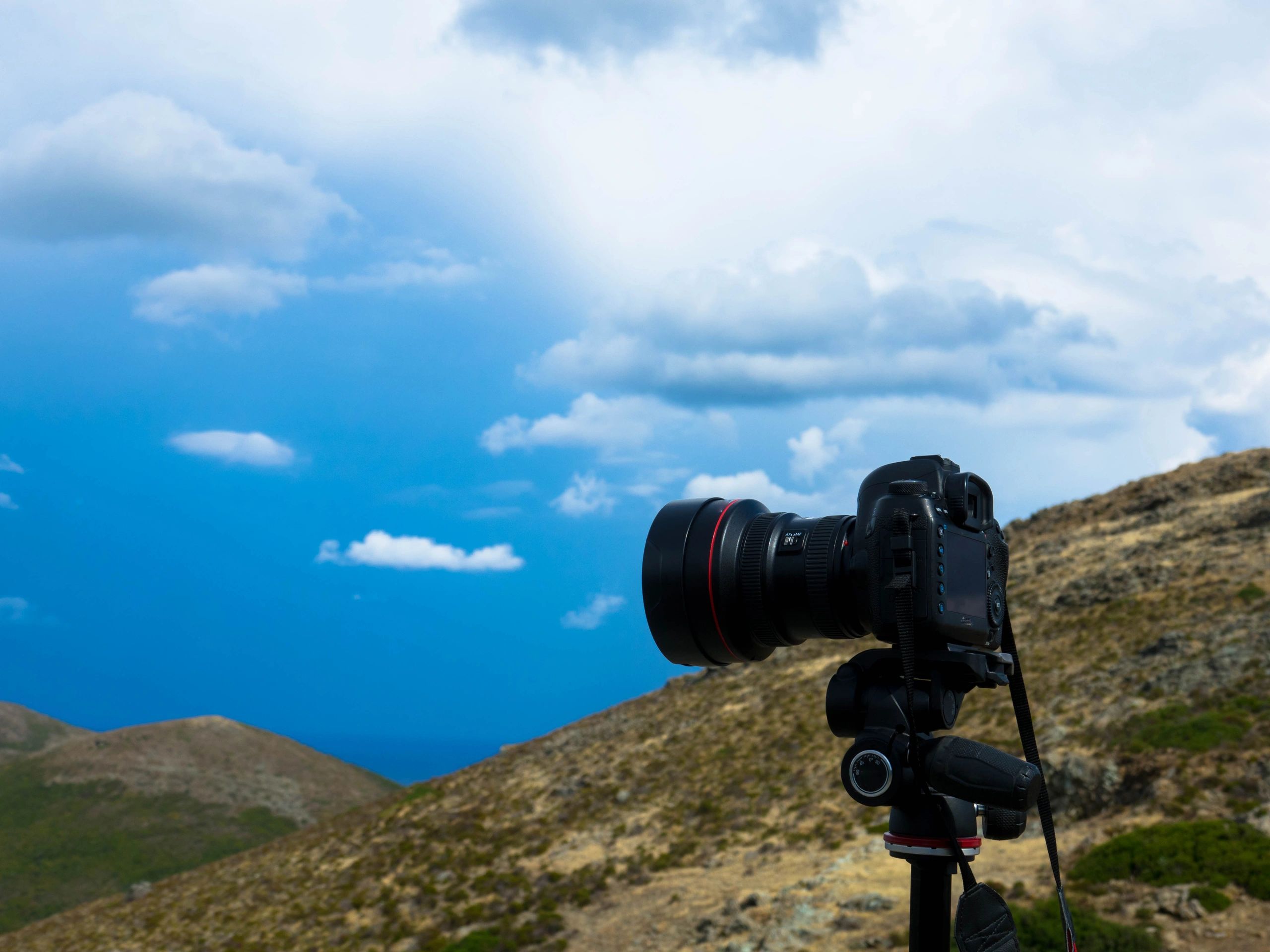 Camera on tripod in a landscape